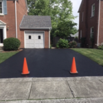 Installed new asphalt driveway