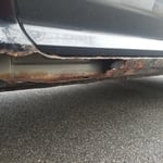Rusted Rocker Panel (Passenger Side)
