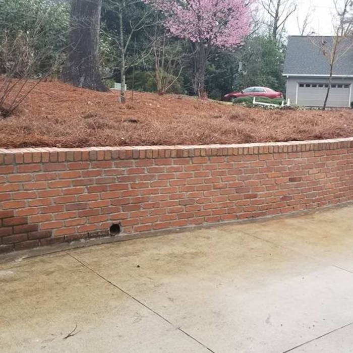 Repair brick retainer wall