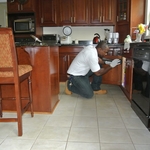 Clifford inspecting kitchen in Gaithersburg, Maryl