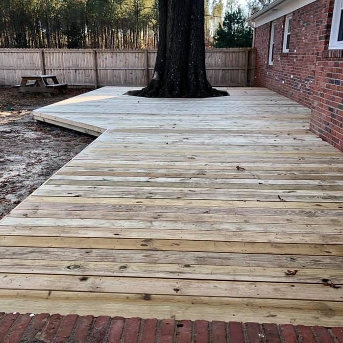 Decking built around the gorgeous oak tree!