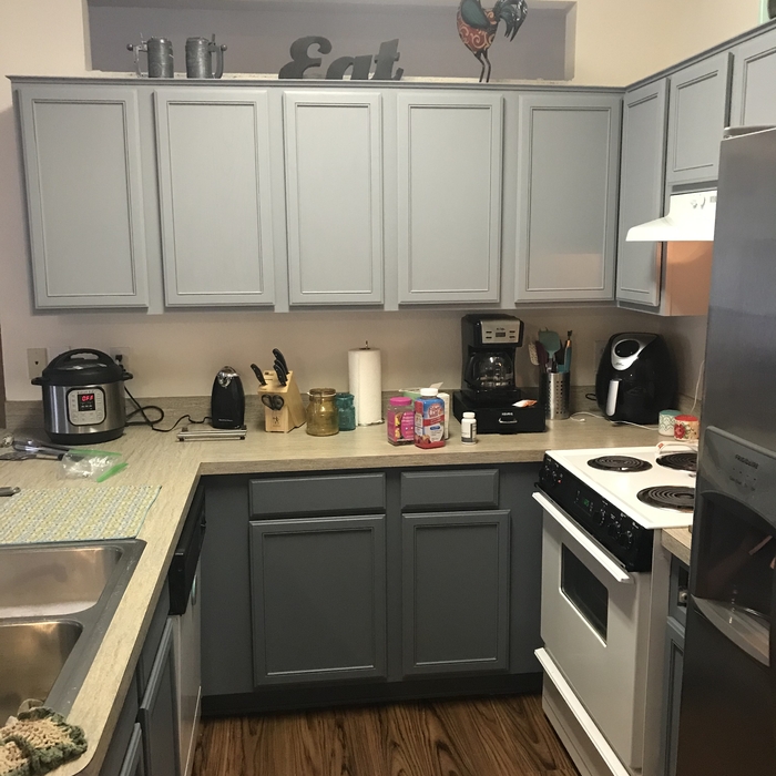 Kitchen cabinet painting completed