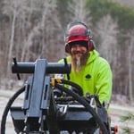 Jason running the mini skid