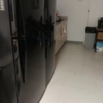 wiping down refrigerator and counters