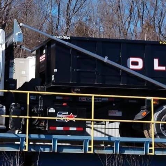 Roll off Truck #12 with a 20yd Dumpster