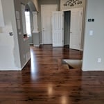 Walnut floor in entry.