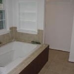 tub,toilet around corner