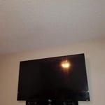 TV wall mount with surround sound bar