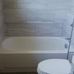 signature shower with a tub