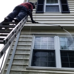 Pressure Washing in the Rear of Home