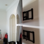 2 TVs same wall