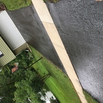 Driveway seal coated by hand