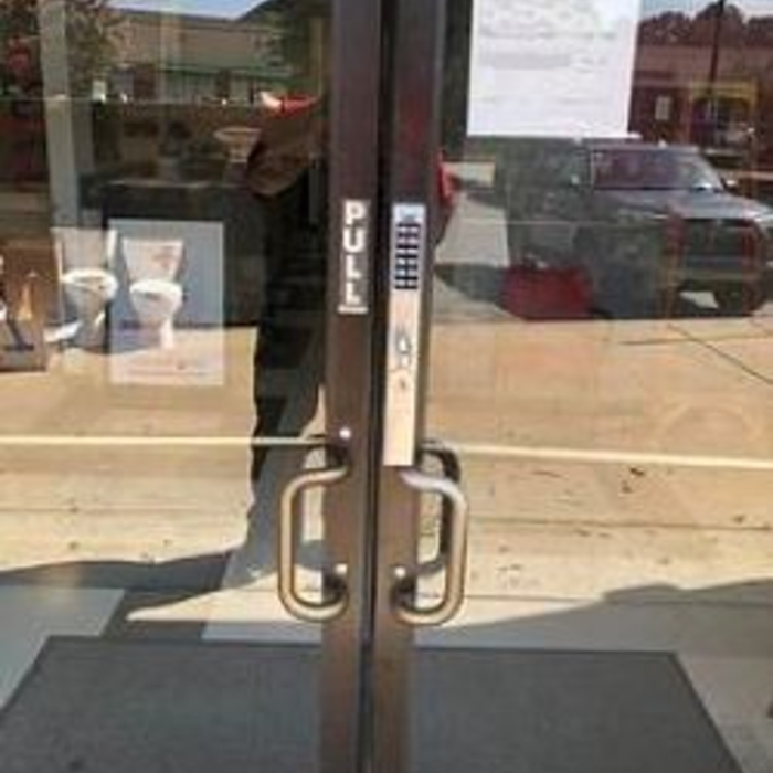 Pin access battery operated lock