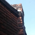 Leaning and damaged chimney