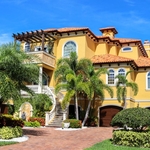 Arched Windows with Grids on a Mediterranean House