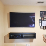 Curved TV with “Power Bridge Kit&rdq