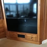 The big open space under the new TV