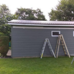 New siding being installed
