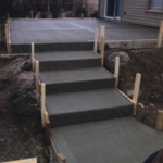 Concrete patio, walks, and steps
