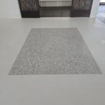 mosaic inlay in the limestone floors