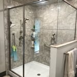 Large Dual Fixture Walk-In with Half Wall