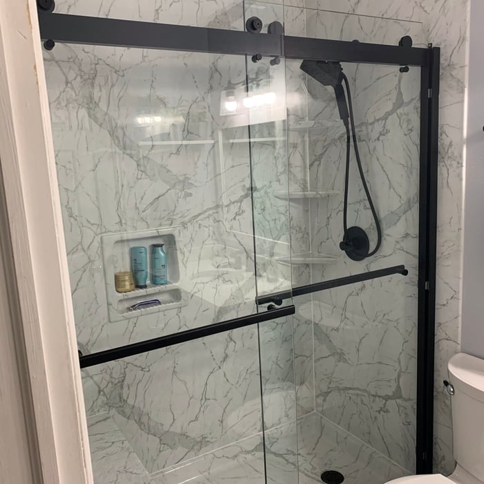 Marble Walk-In with Hanging Barn Style Glass Door