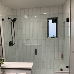 Two panels and a door in the middle