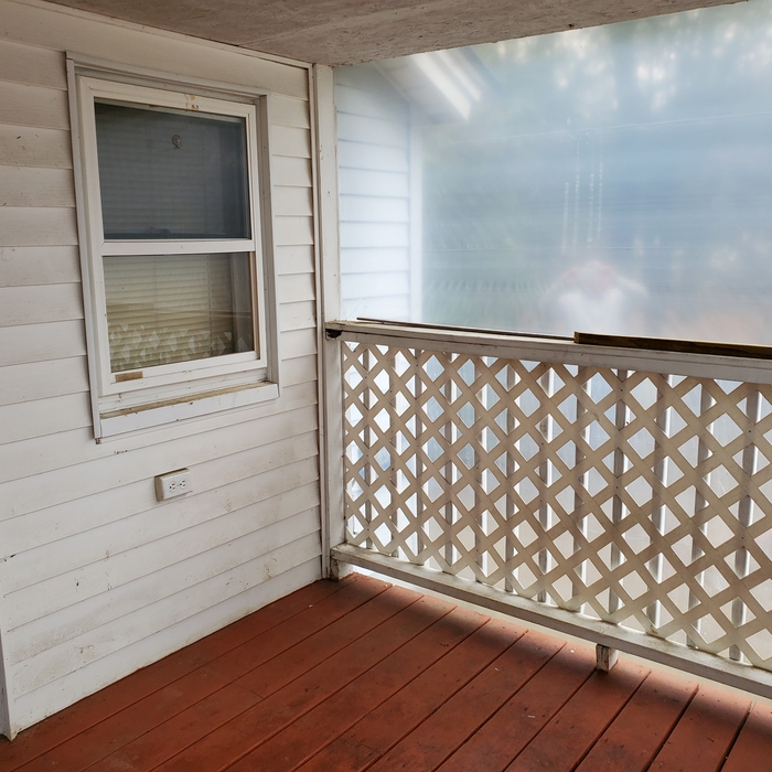 This was a open covered deck which we turned into