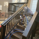 Deck with new stain, applying waterproof coat