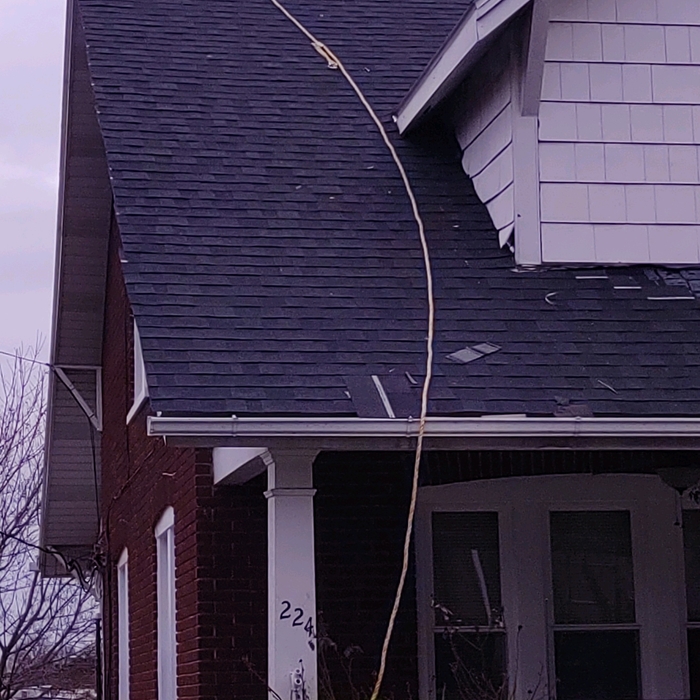 New lifetime roof being nailed on