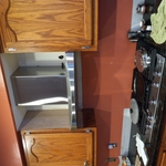 installed Cabinets and custom center shelf