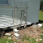Water heater shed