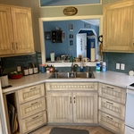 Counter, cabinets, all custom, even backsplash
