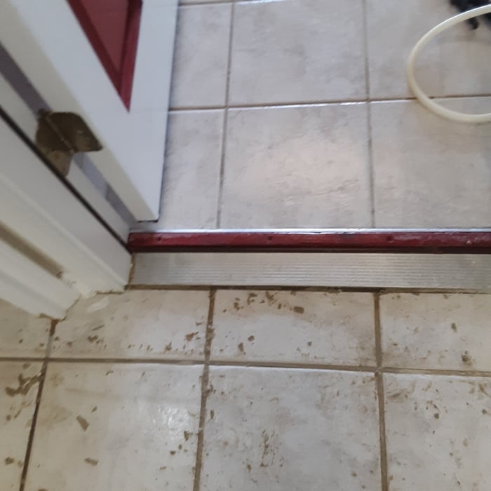 Grout removal process