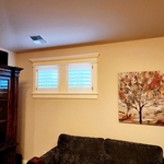 Shutter with ornate moulding