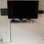 TV Mount With Game Systems And Controllers