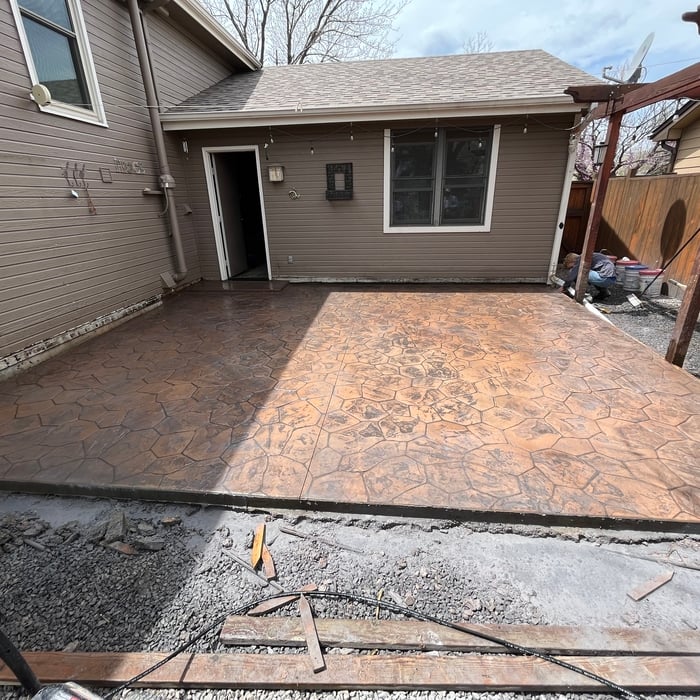 Wood deck to stamped concrete