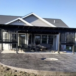 Back stamped patio with pergola