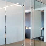 White Frosted on divider doors and wall