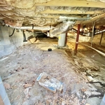 Before Picture of a old damaged vapor barrier