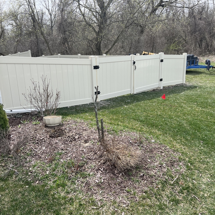 Tan vinyl fence in Canton