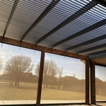 Pergola with shades down