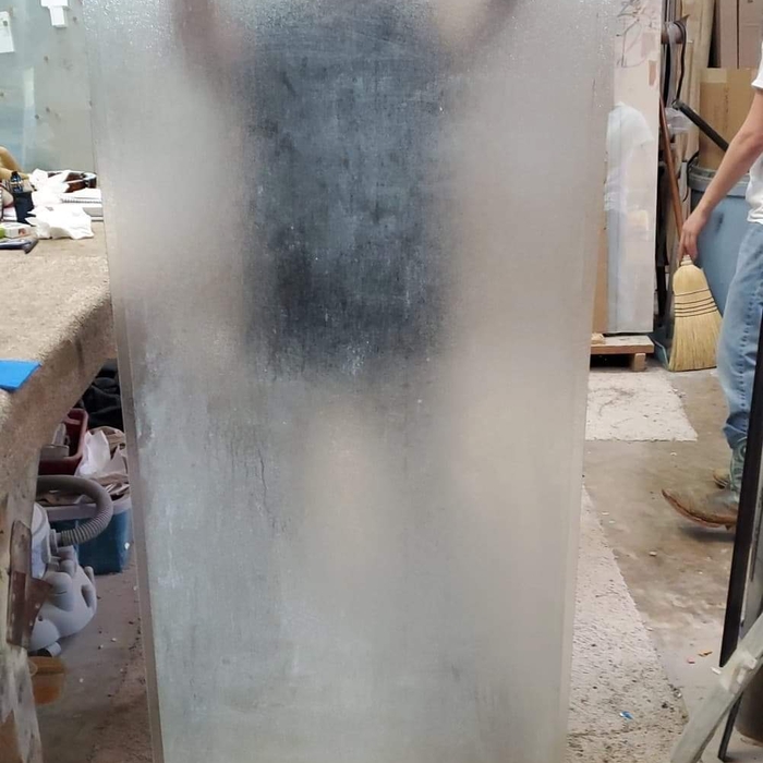 GLASS PANEL BEFORE BEING CLEANED